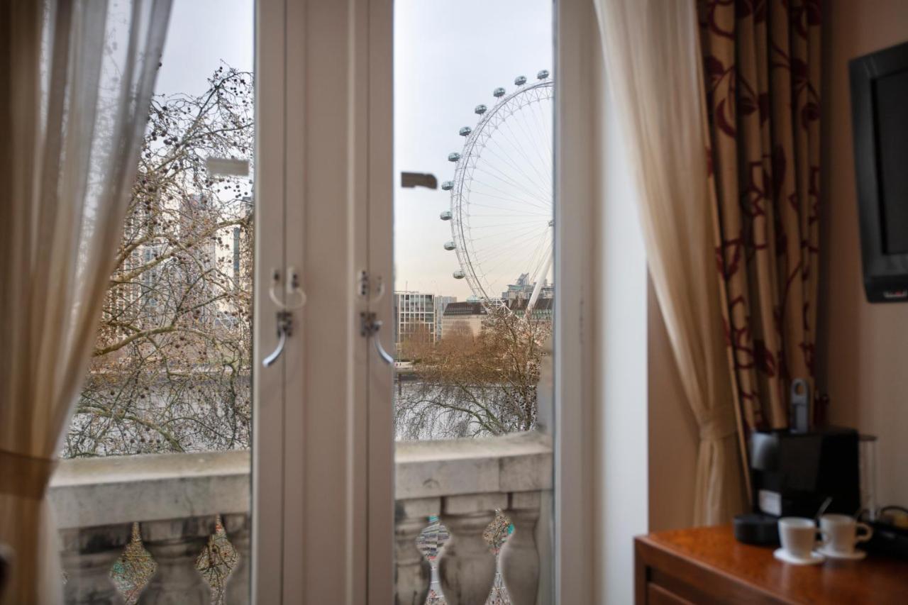 Vista fenomenal do Rio Tâmisa e do London Eye a partir de quarto do The Royal Horseguards Hotel